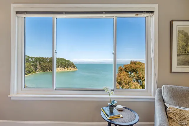 a spacious bathroom with a granite countertop sink mirror and a