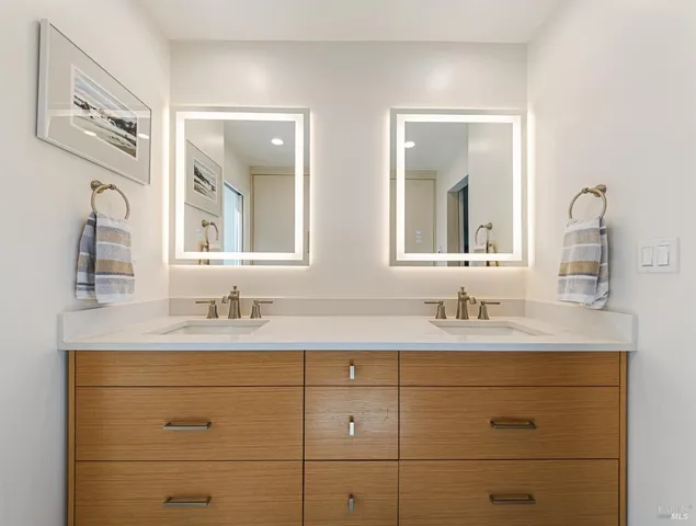 a spacious bathroom with a bathtub and shower