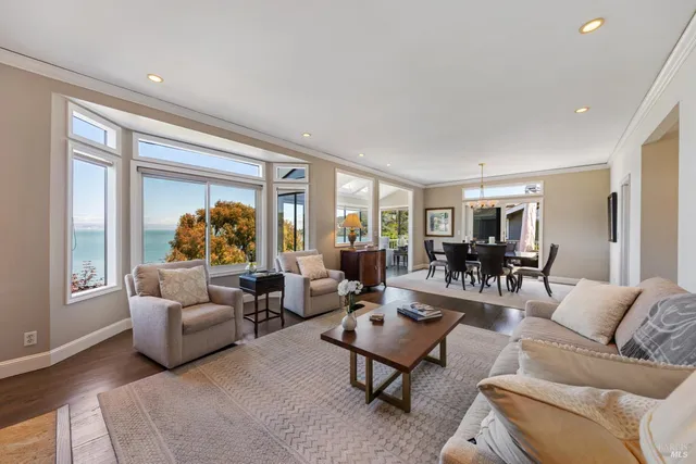 a view of a dining room with furniture window and outside view