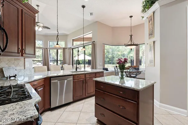 a view of a hallway with seating area