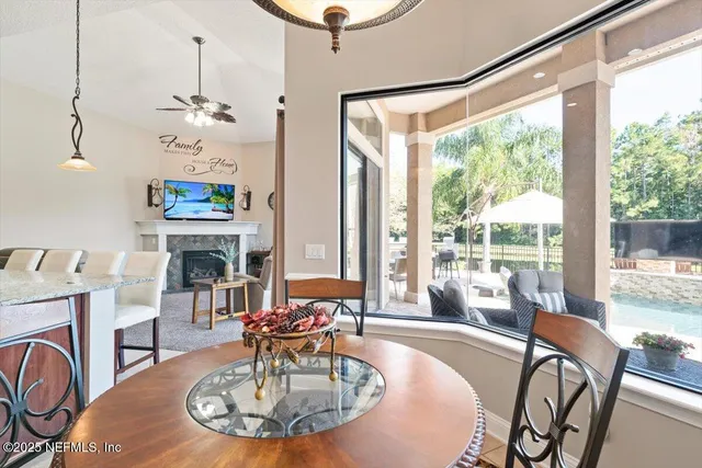 a front view of a house with a garden and yard