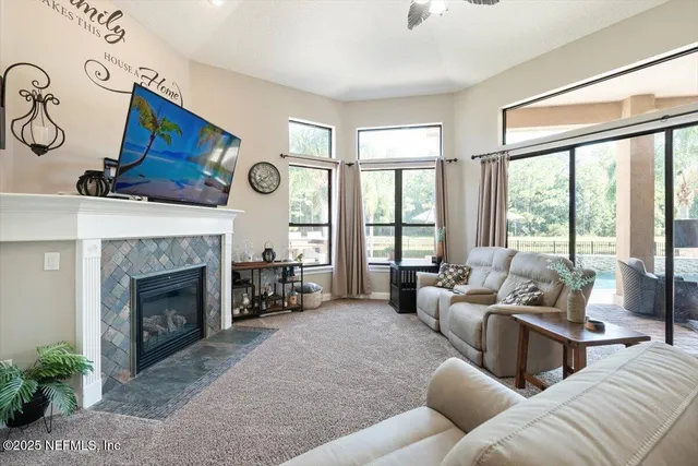 a view of a swimming pool and lounge chairs