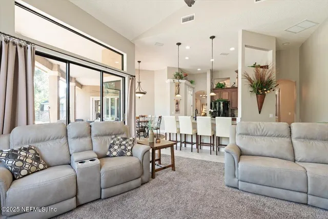 a view of a patio with swimming pool