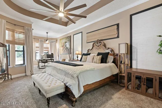 a view of a house with backyard porch and sitting area