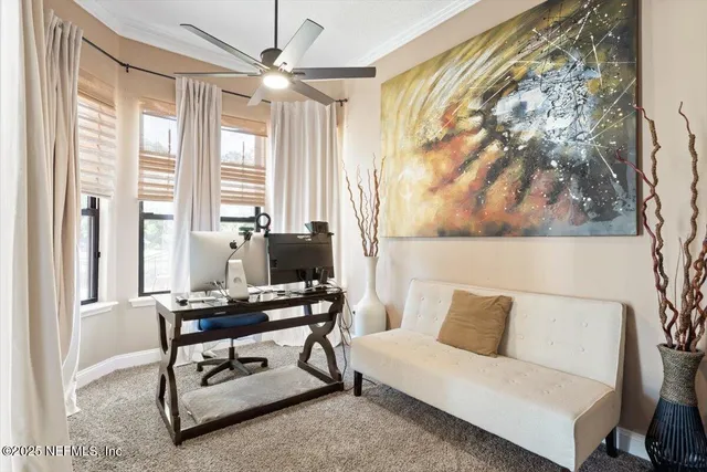 an aerial view of a house with a garden