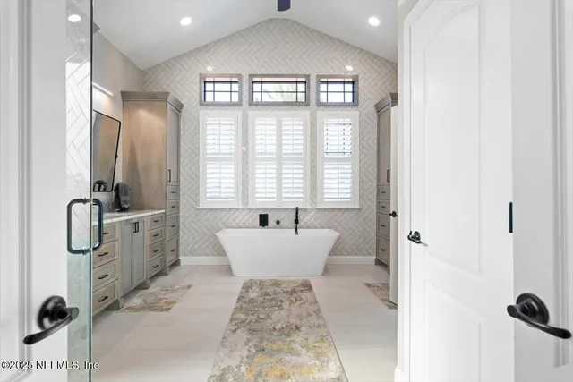 an aerial view of a house with a garden