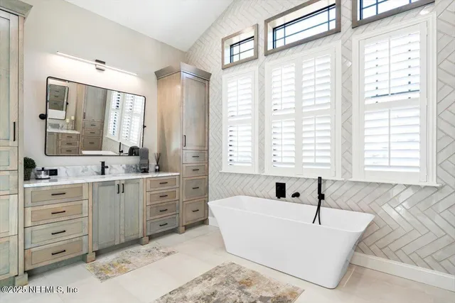 a view of a swimming pool with a sitting area