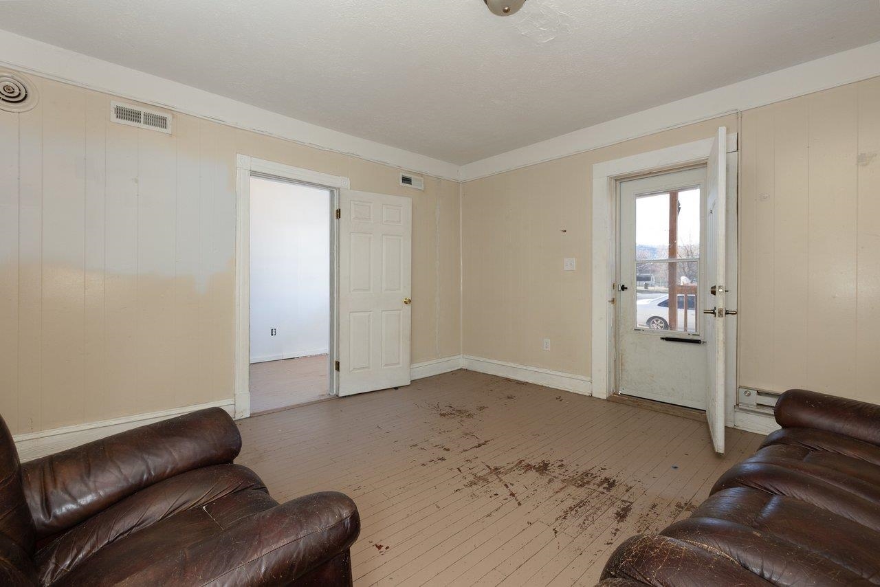317 West 12th Street Waynesboro, VA 22980 - Photo 5 of 39 a bedroom with a bed and couch