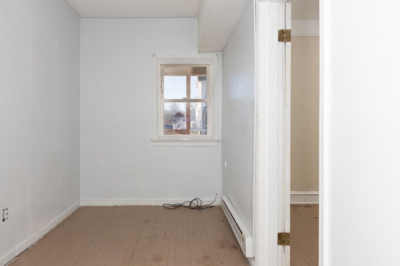 317 West 12th Street Waynesboro, VA 22980 - Photo 6 of 39 a view of an empty room with windows