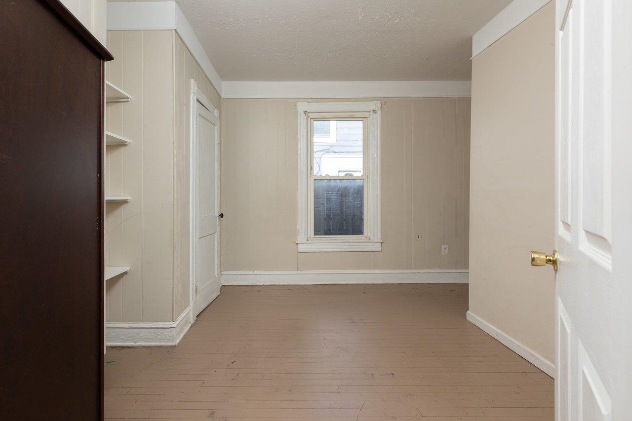 317 West 12th Street Waynesboro, VA 22980 - Photo 9 of 39 a view of an empty room with a window
