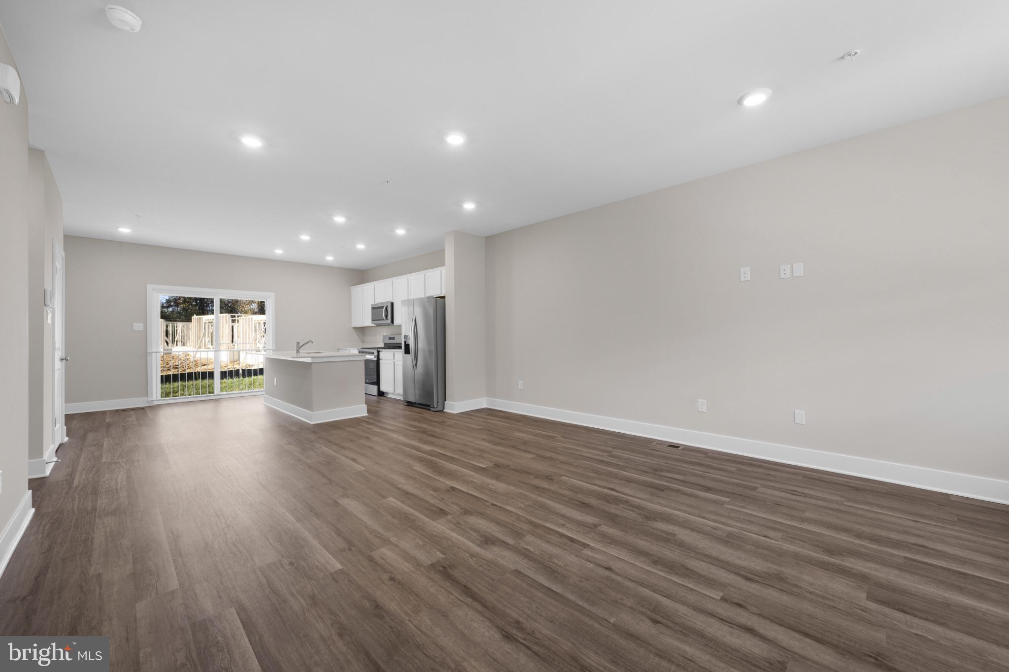 355 Hackley Drive Joppa, MD 21085 - Photo 11 of 38 a view of empty room with wooden floor