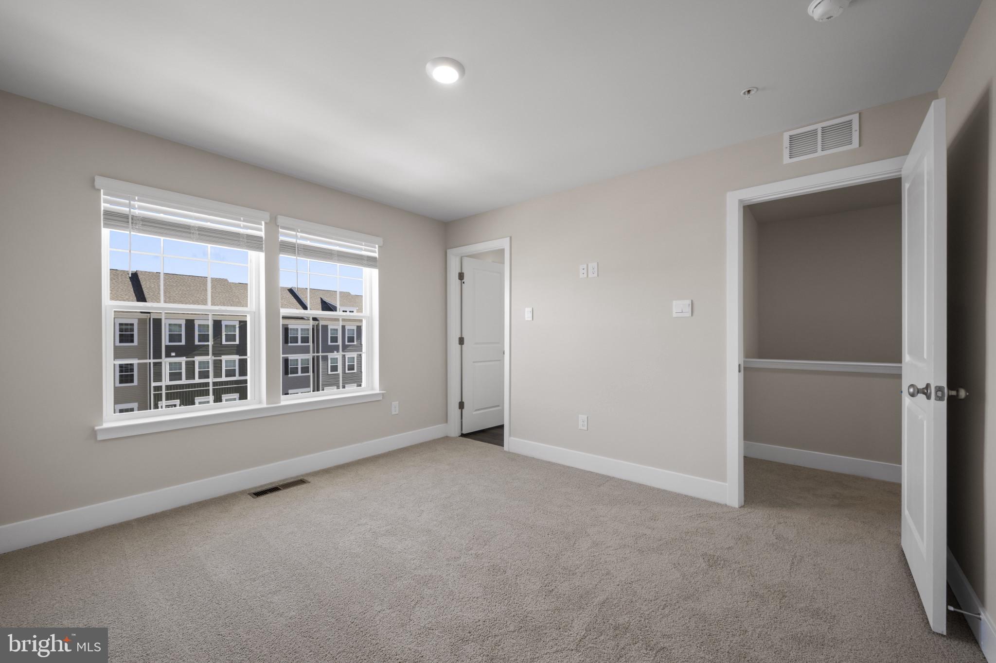 355 Hackley Drive Joppa, MD 21085 - Photo 20 of 38 a view of an empty room with a window