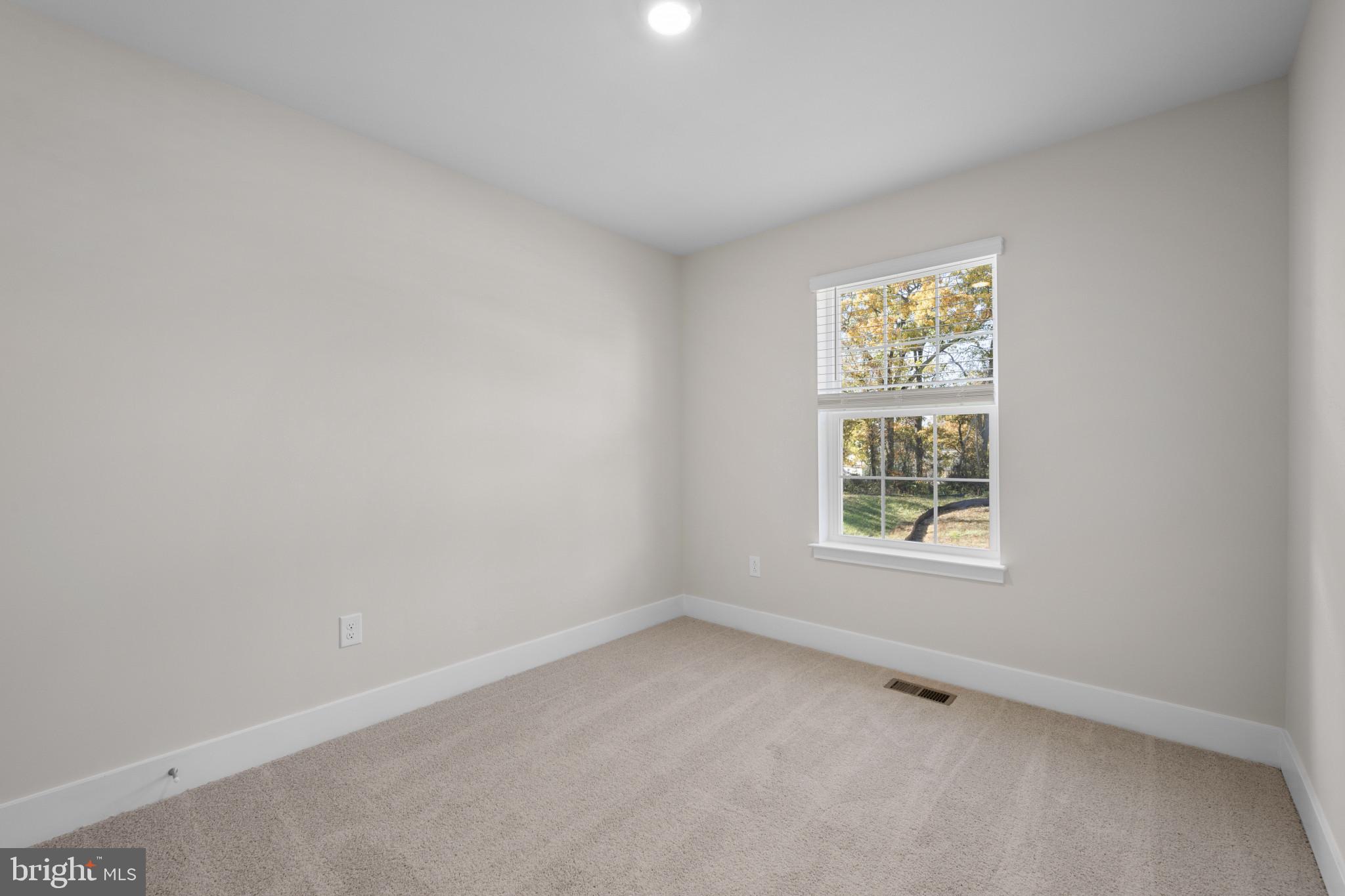 355 Hackley Drive Joppa, MD 21085 - Photo 26 of 38 an empty room with a window