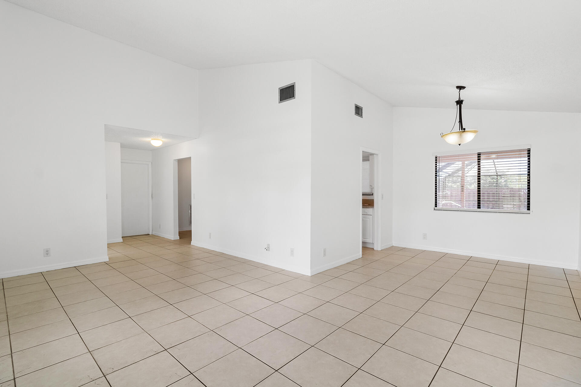 22544 Swordfish Drive Boca Raton, FL 33428 - Photo 6 of 27 Living/Dining Room