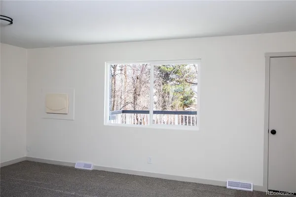 an empty room with a window