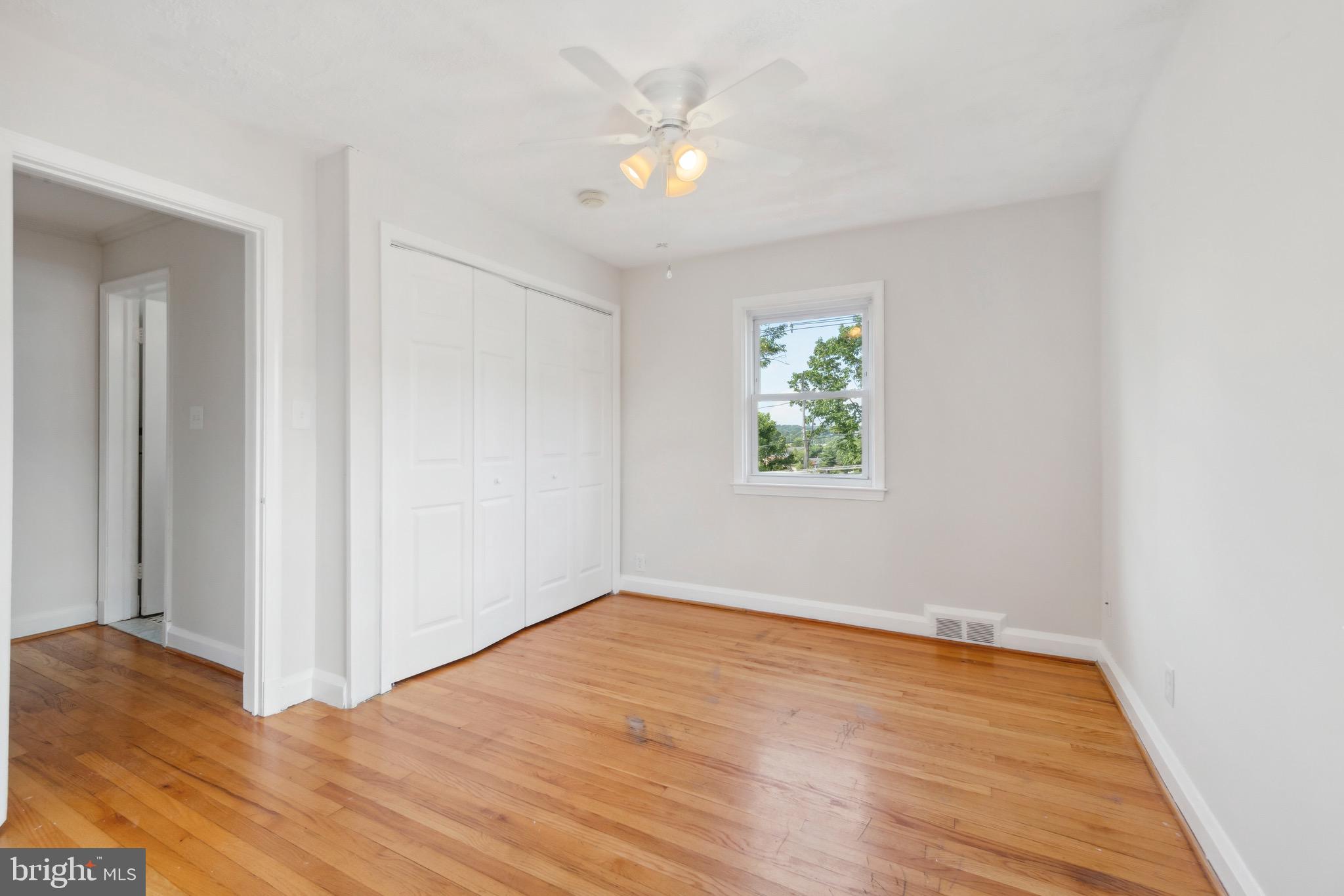 1010 Elm Road Halethorpe, MD 21227 - Photo 14 of 32 Bedroom One w/ Fresh Paint and Wood Floors