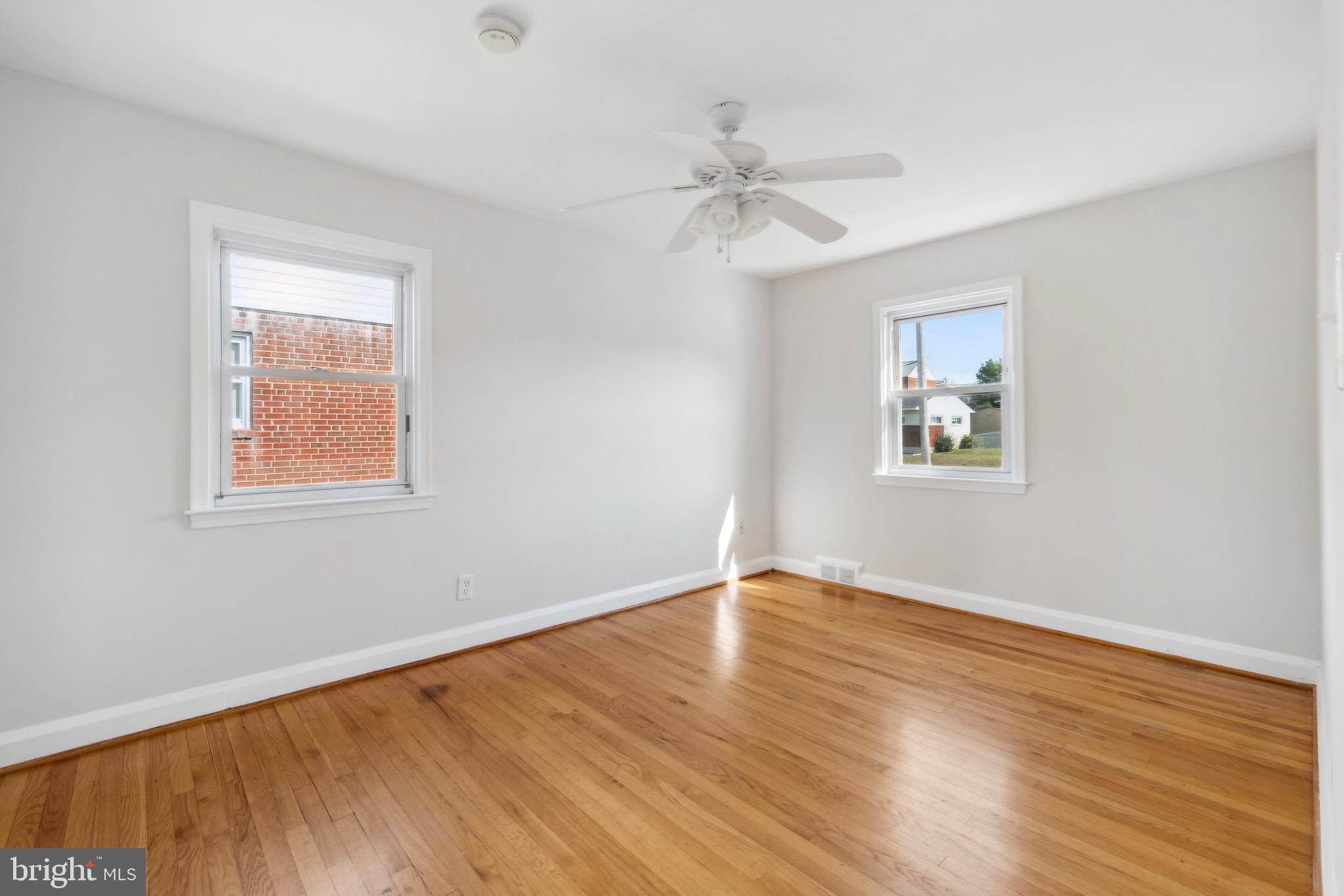 1010 Elm Road Halethorpe, MD 21227 - Photo 16 of 32 Bedroom Two w/ Fresh Paint and Wood Floors