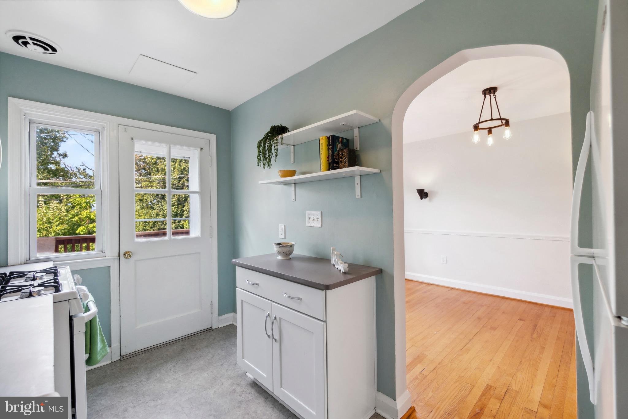 1010 Elm Road Halethorpe, MD 21227 - Photo 9 of 32 Adorable and Freshly Updated Kitchen w/ Arch Entry