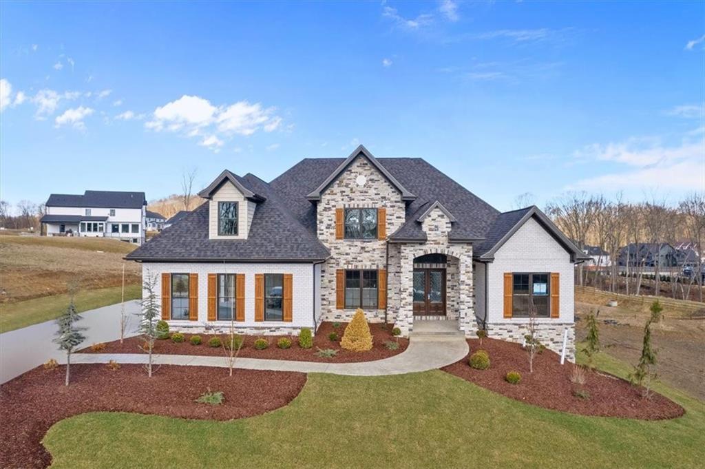 2002 Mallard Lane Baden, PA 15005 - Photo 1 of 3 front view of a house with yard porch and furniture