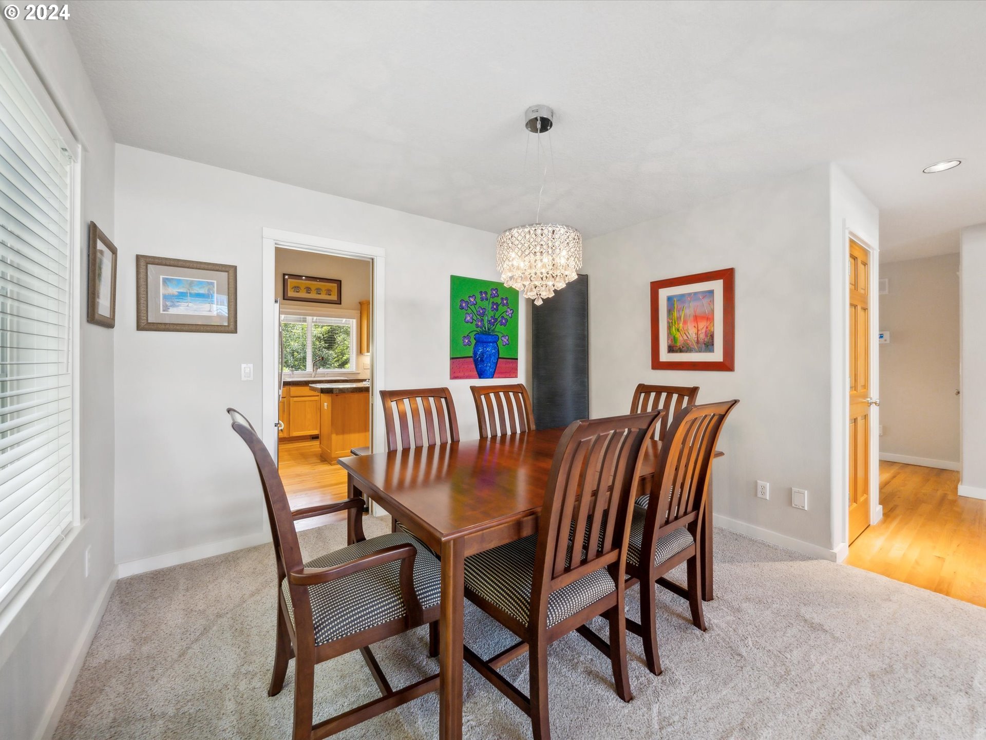16368 Northwest Graf Street Portland, OR 97229 - Photo 19 of 46 a view of a dining room with furniture and a potted plant