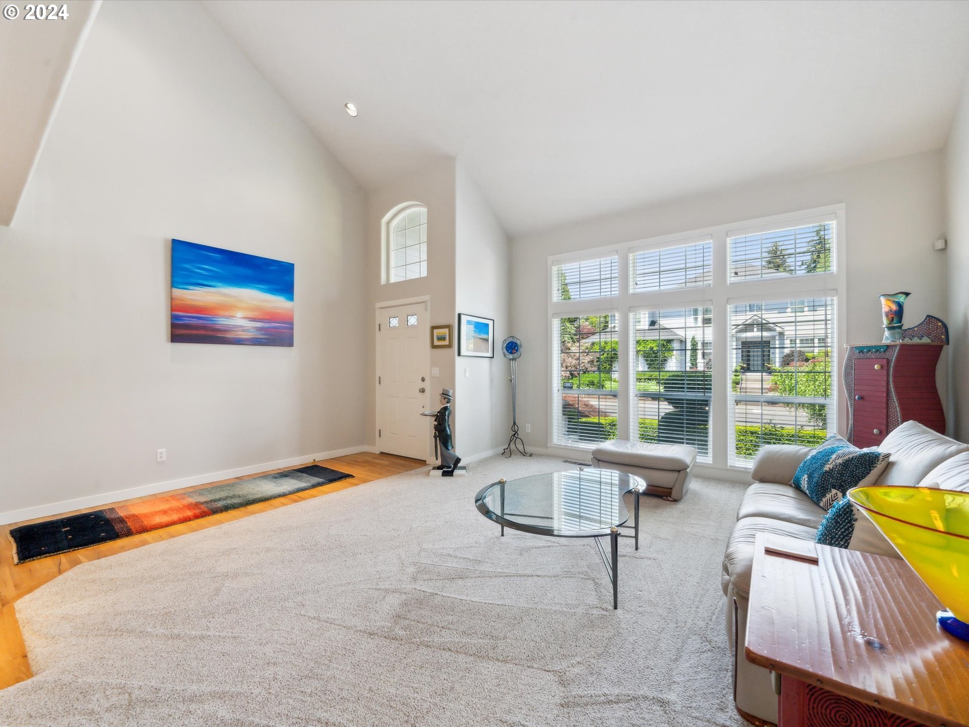16368 Northwest Graf Street Portland, OR 97229 - Photo 2 of 46 a living room with furniture and a large window