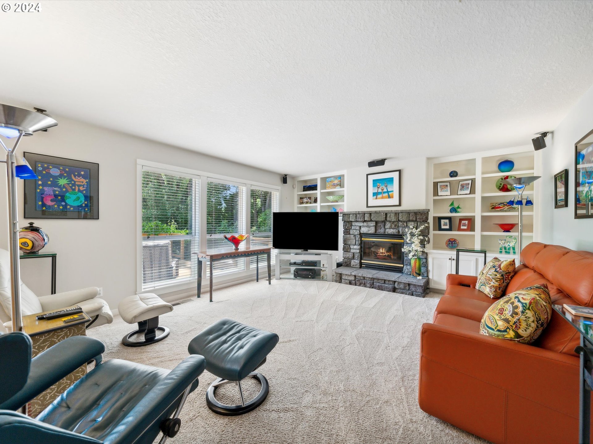 16368 Northwest Graf Street Portland, OR 97229 - Photo 24 of 46 a living room with furniture and a flat screen tv