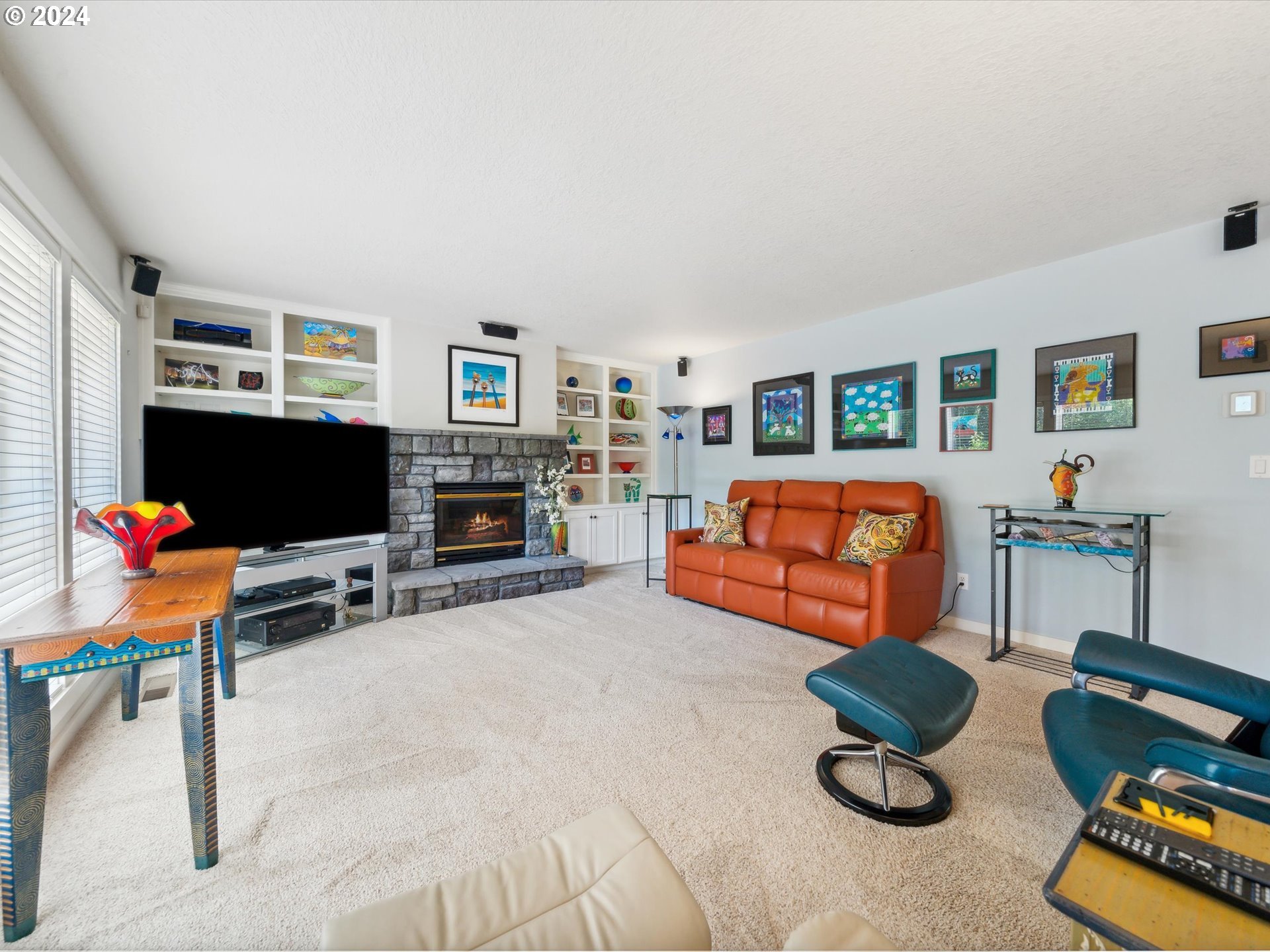 16368 Northwest Graf Street Portland, OR 97229 - Photo 25 of 46 a living room with furniture and a flat screen tv