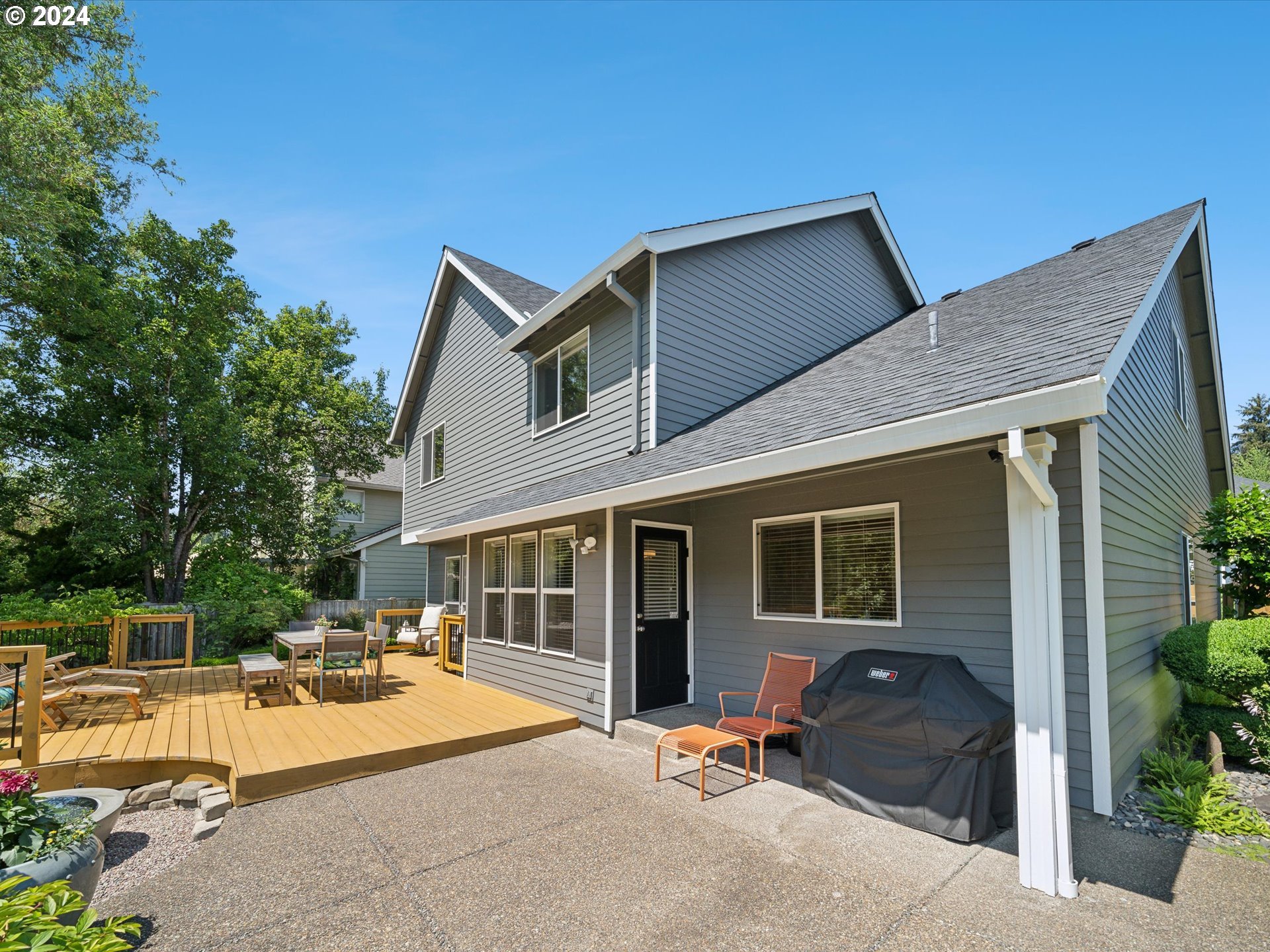 16368 Northwest Graf Street Portland, OR 97229 - Photo 39 of 46 a view of backyard with outdoor seating and plants