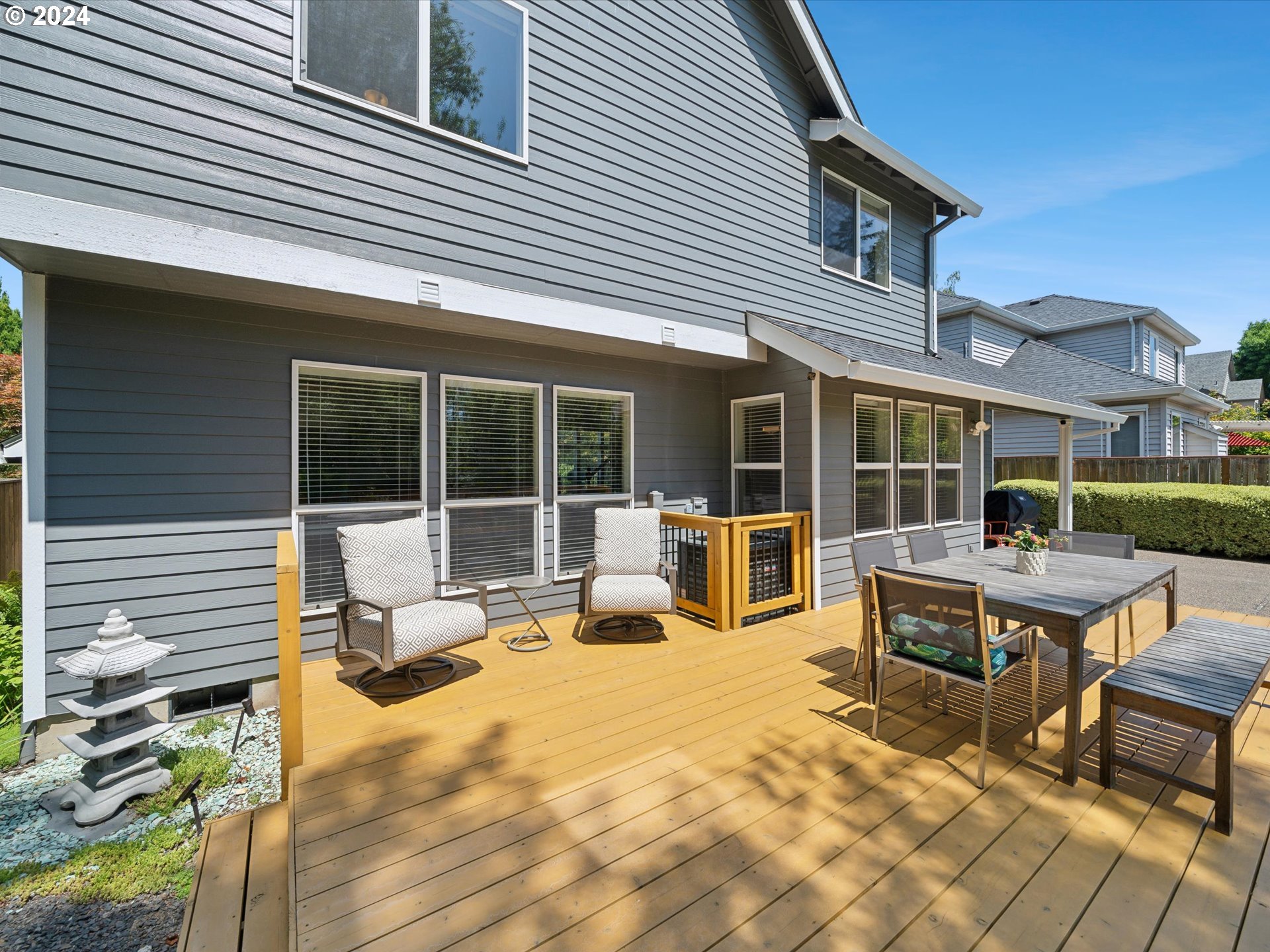 16368 Northwest Graf Street Portland, OR 97229 - Photo 41 of 46 a view of a dinning table and chairs in patio of the house