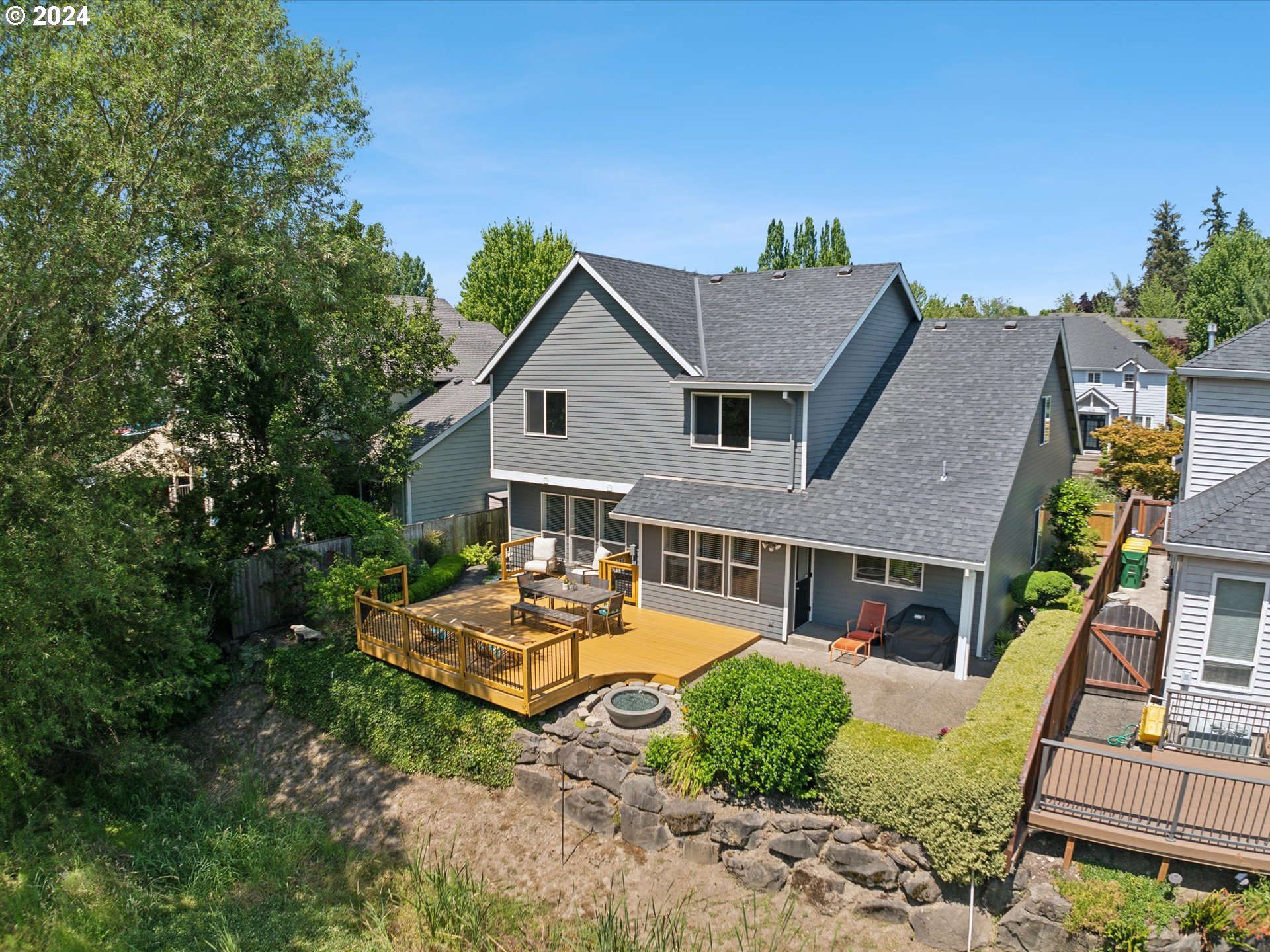 16368 Northwest Graf Street Portland, OR 97229 - Photo 42 of 46 a view of a house with pool and chairs