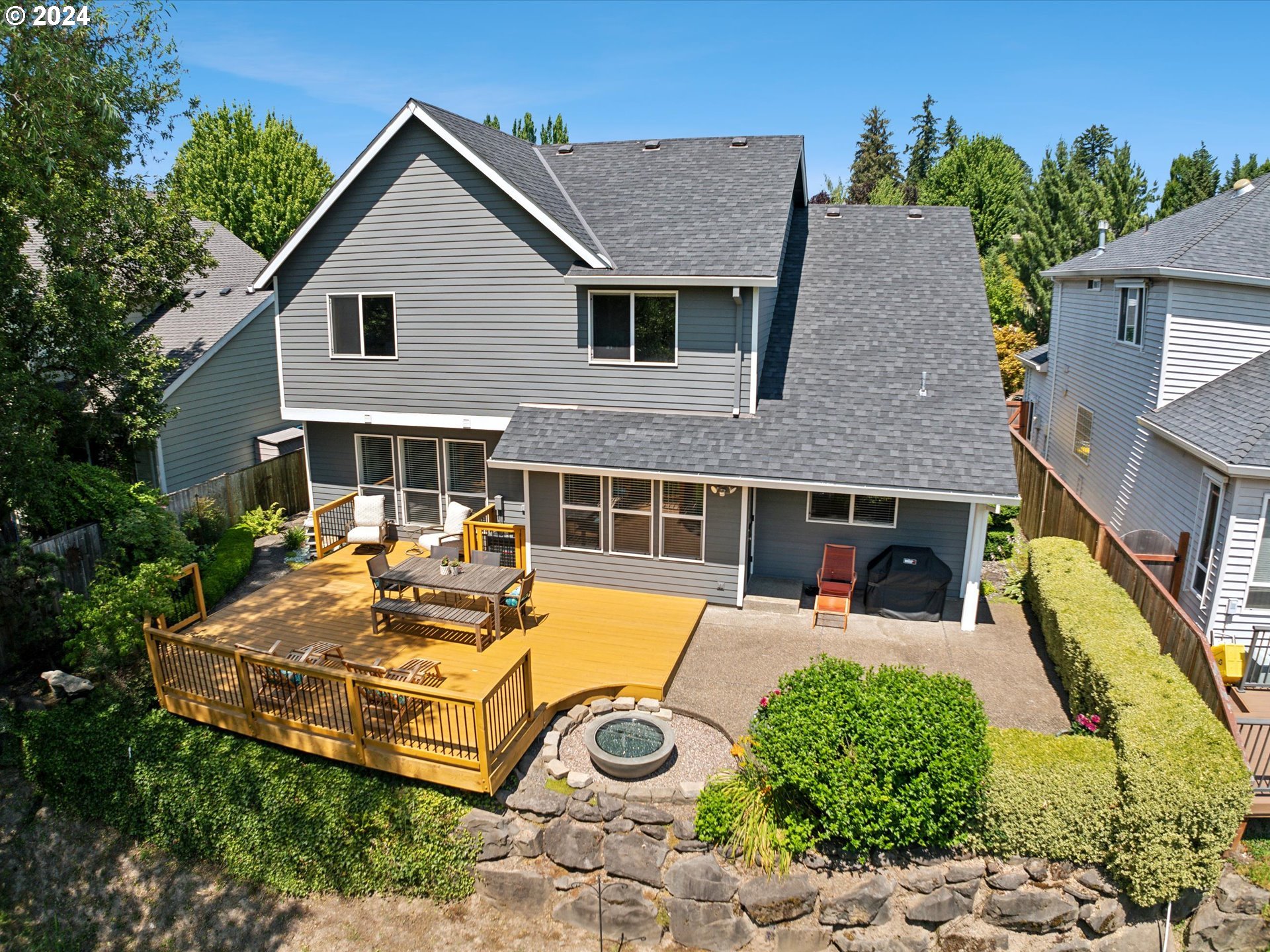 16368 Northwest Graf Street Portland, OR 97229 - Photo 10 of 46 a front view of a house with patio