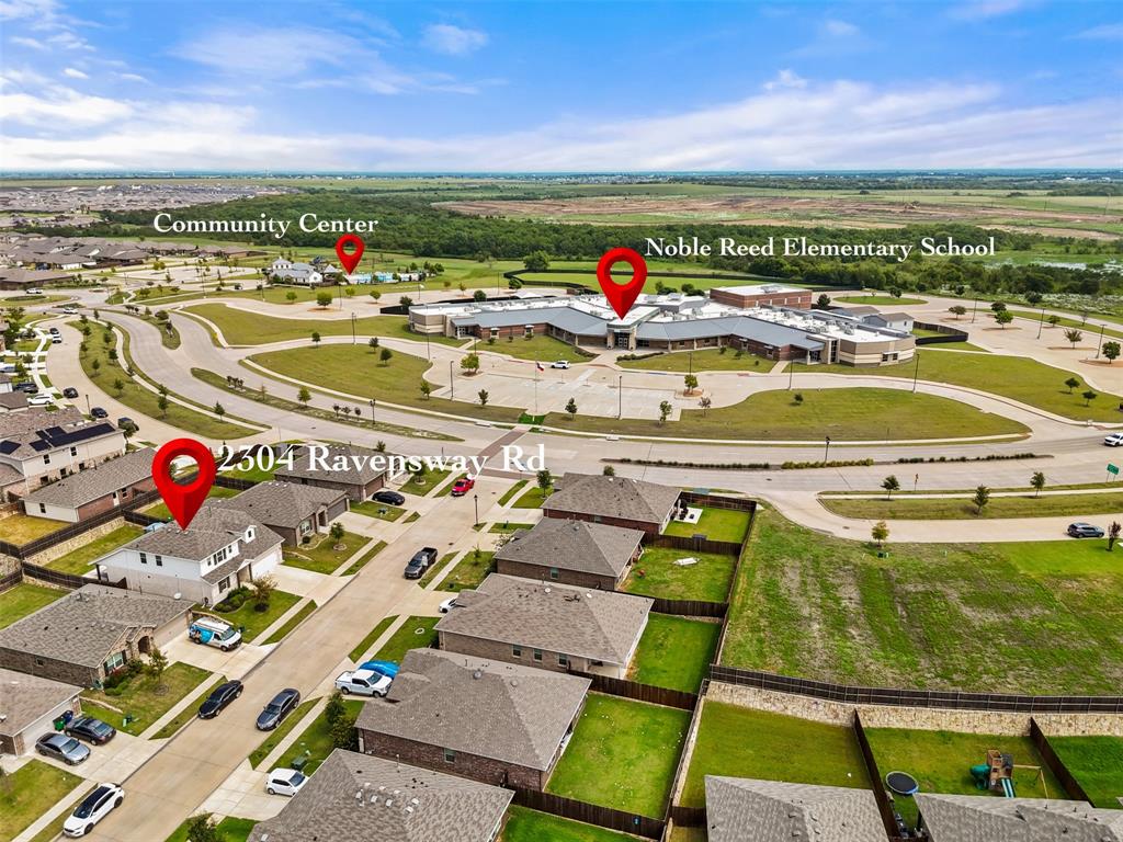 2304 Ravensway Road Crandall, TX 75114 - Photo 7 of 22 a view of a swimming pool with a lounge chairs