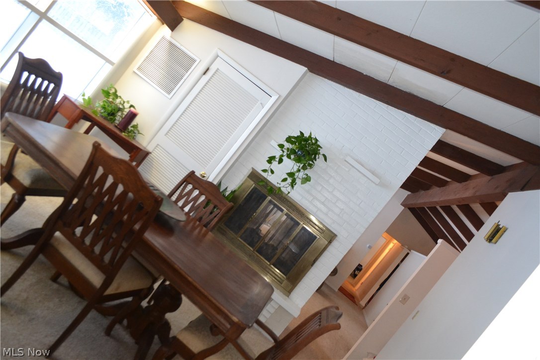 35380 Solon Road Solon, OH 44139 - Photo 10 of 18 Great space with floor to ceiling windows. These windows just illuminate this room on a snowy day.