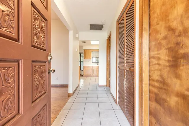 a bathroom with a glass door shower