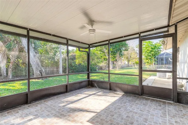a view of empty room with floor to ceiling window and floor to ceiling window