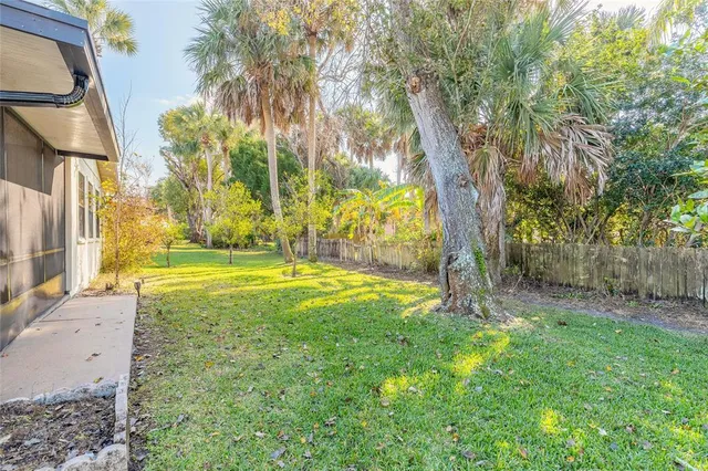 a view of yard with swimming pool
