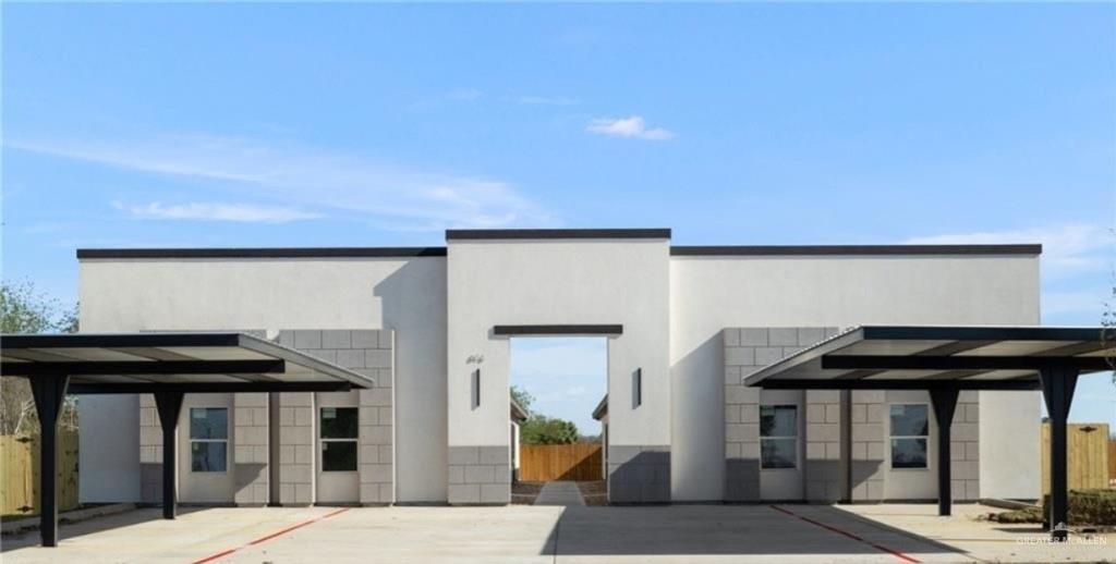 616 Mountain Road, Unit 5B Mission, TX 78573 - Photo 1 of 17 a front view of a building with parking space and windows