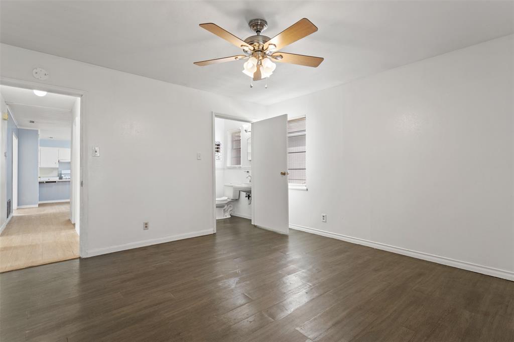 3126 Colgate Avenue Tyler, TX 75701 - Photo 15 of 33 wooden floor in an empty room with a window