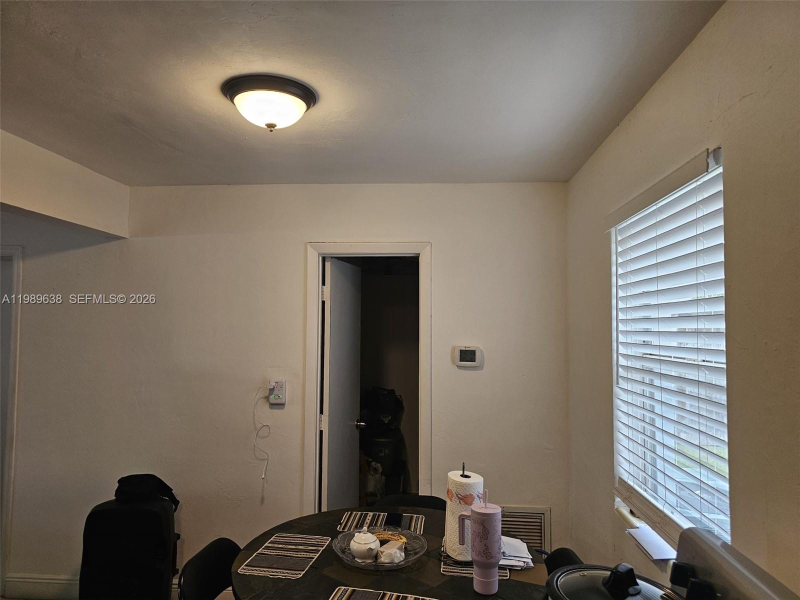 569 Tallulah Road Lake Worth, FL 33462 - Photo 26 of 40 a bathroom with a sink and a mirror