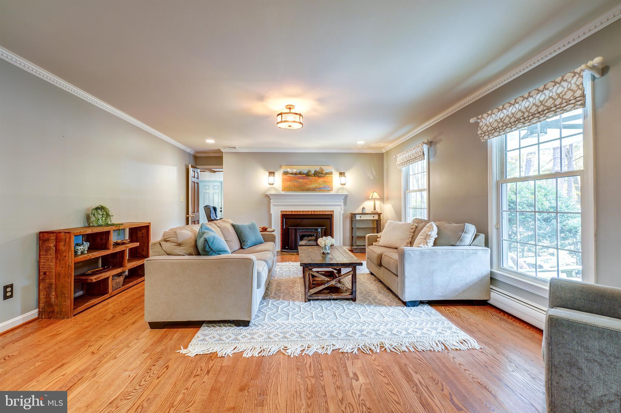 1210 Ashton Road Ashton, MD 20861 - Photo 8 of 37 Spacious Living Room with Wood Stove