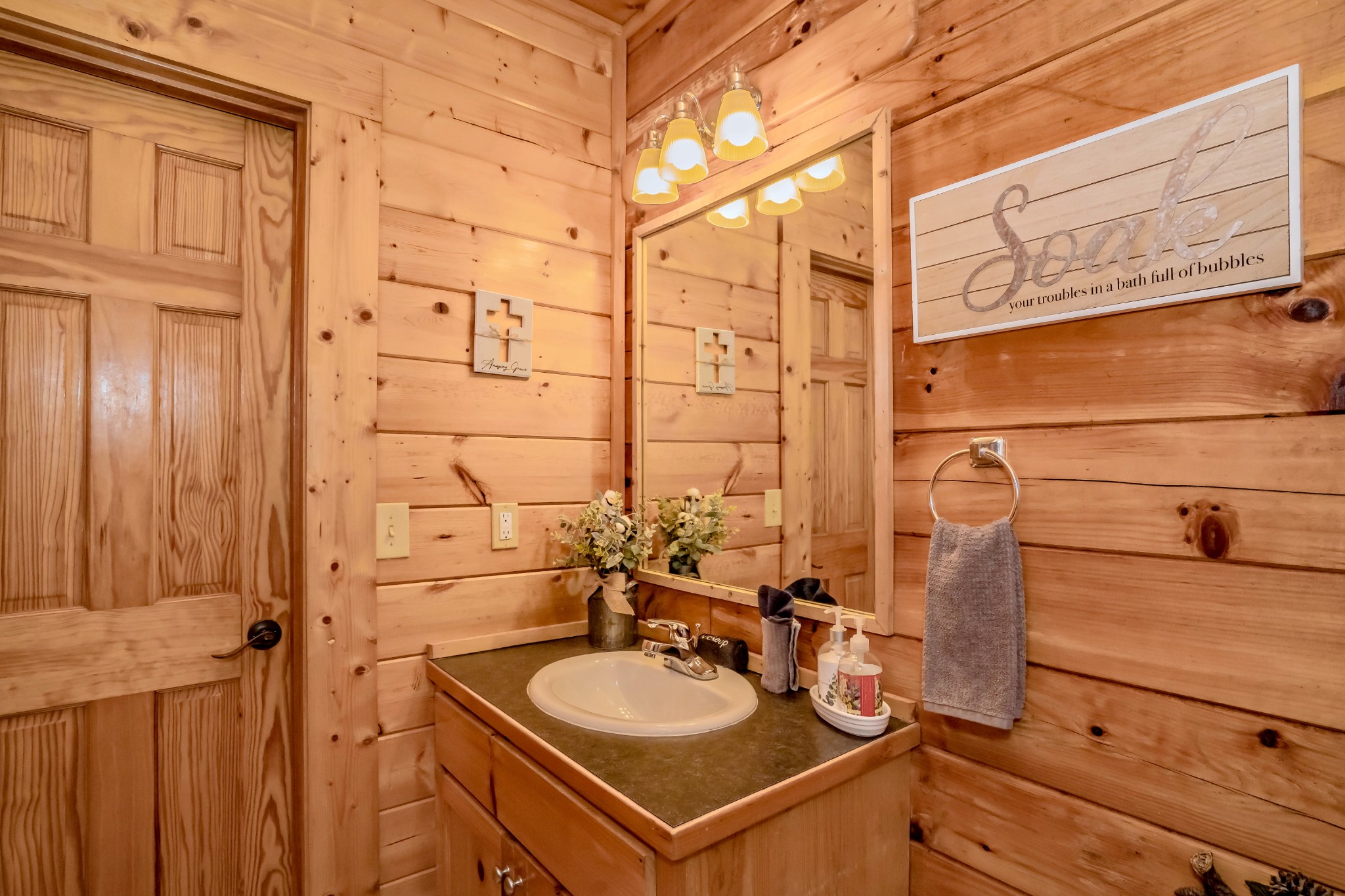 552 Blackberry Rdg Way Sevierville, TN 37863 - Photo 11 of 22 a bathroom with a sink and a mirror
