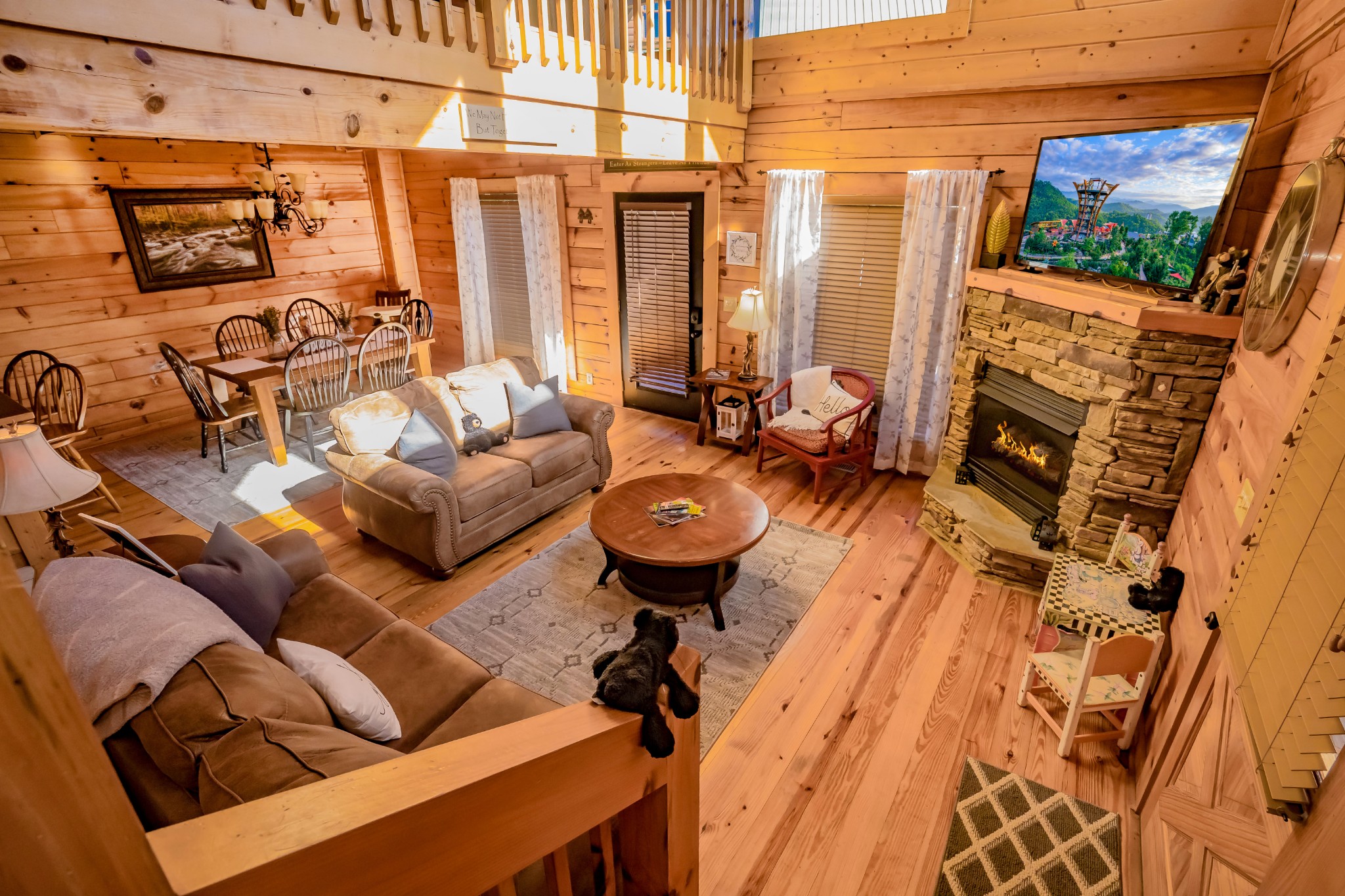 552 Blackberry Rdg Way Sevierville, TN 37863 - Photo 12 of 22 a living room with furniture a fireplace and a flat screen tv