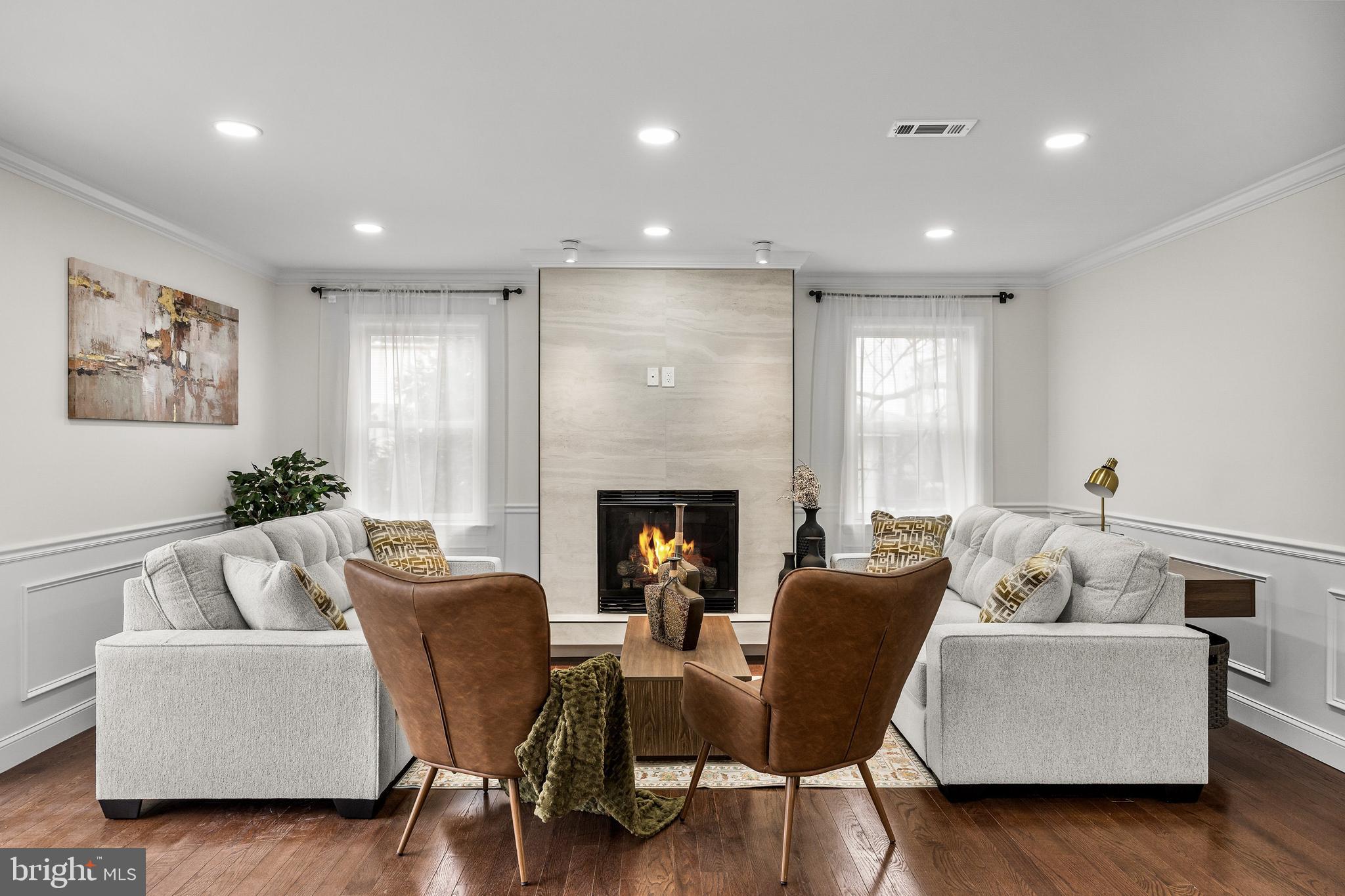 15 Cuthbert Boulevard Haddon Township, NJ 08107 - Photo 14 of 60 a living room with furniture and a fireplace