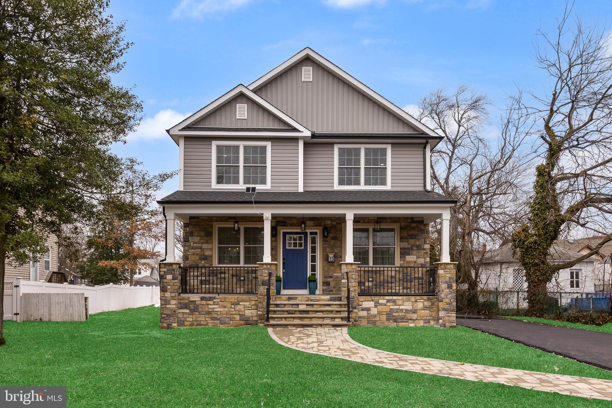 15 Cuthbert Boulevard Haddon Township, NJ 08107 - Photo 2 of 60 a front view of a house with a yard