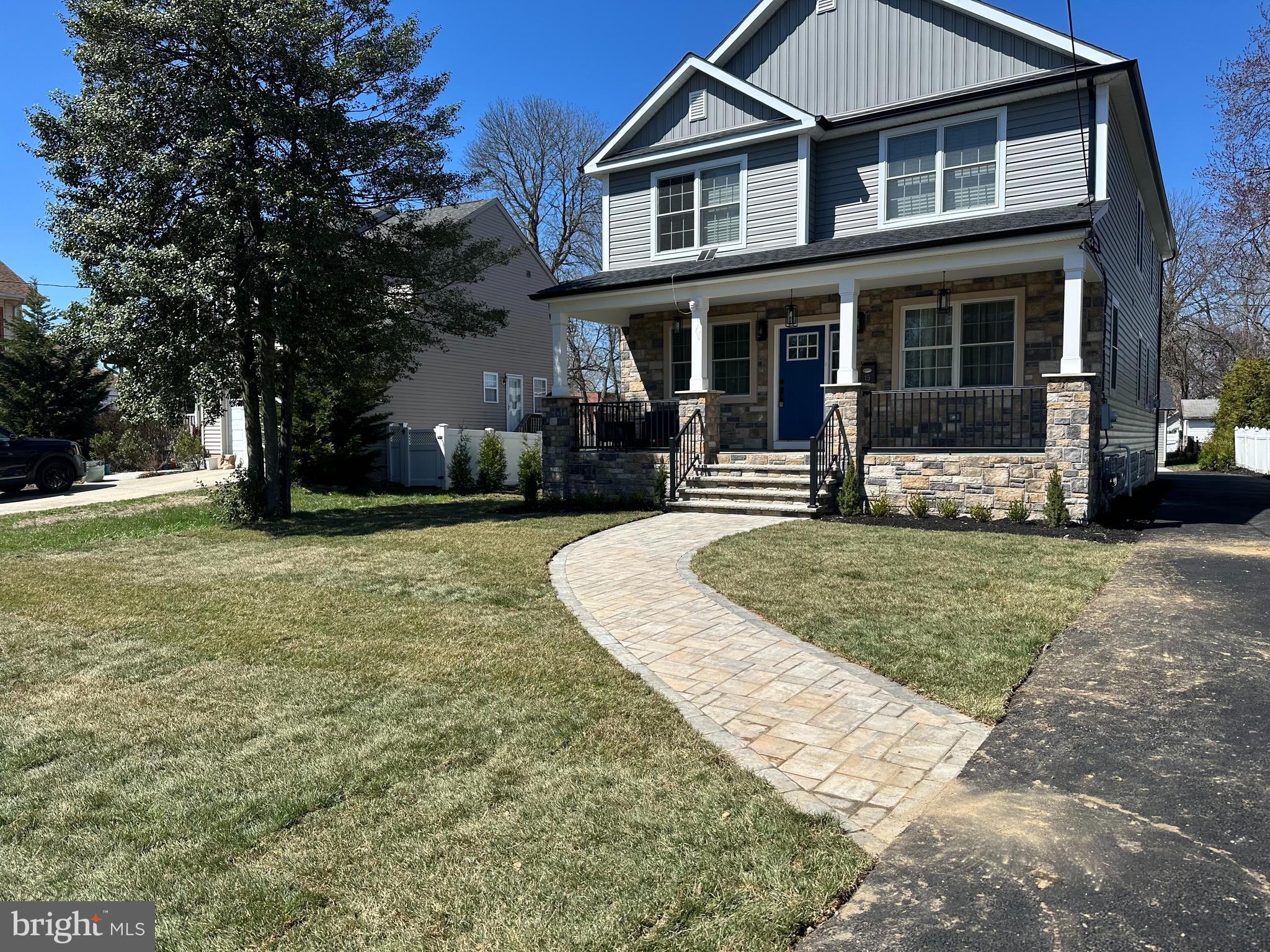 15 Cuthbert Boulevard Haddon Township, NJ 08107 - Photo 3 of 60 a front view of a house with a yard