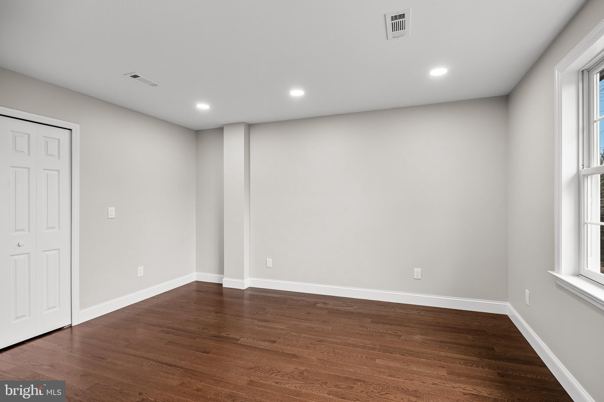 15 Cuthbert Boulevard Haddon Township, NJ 08107 - Photo 45 of 60 wooden floor in an empty room with a window