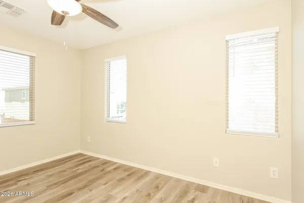 a view of an empty room and window