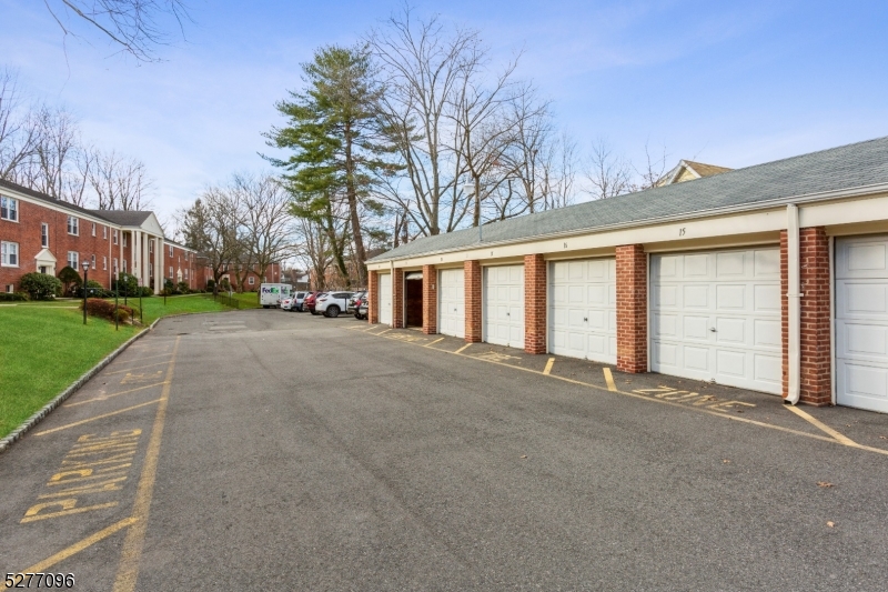 390 Morris Avenue, Unit 29 Summit, NJ 07901 - Photo 2 of 18 a view of a house with a yard
