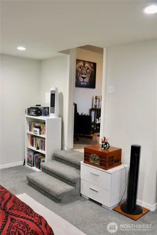 a living room with furniture and a table