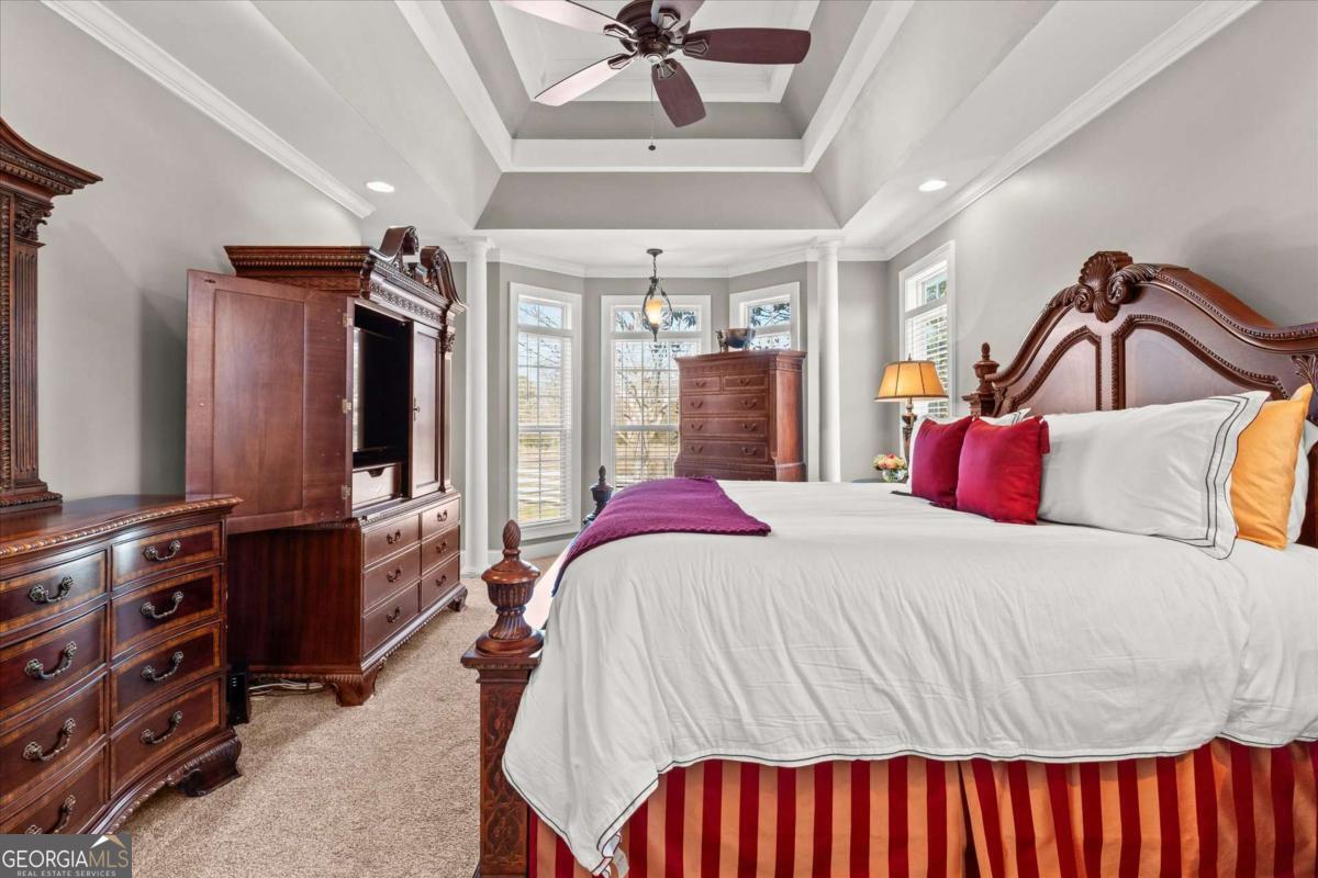 220 McKenzie Bridge Road Carrollton, GA 30117 - Photo 29 of 80 a bedroom with a bed and dresser